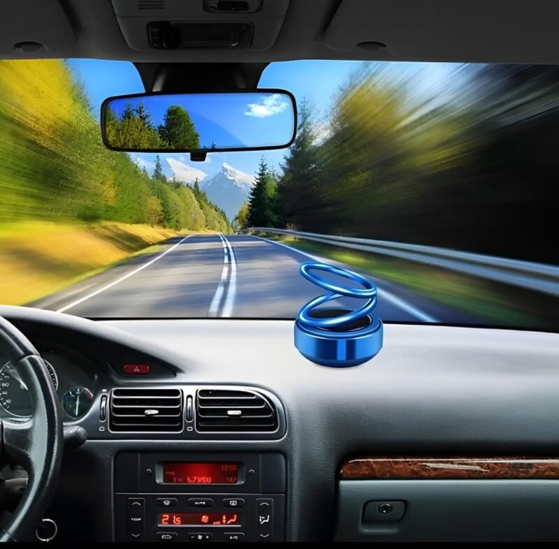 Solar-powered double ring car ornament with aromatherapy feature.