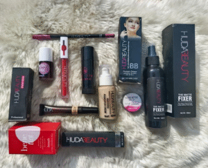 8 in 1 Makeup Deal bundle with foundation, concealer, lip gloss, lip tint, lip pencil, cake liner, make-up fixer, and TV stick – complete beauty set for flawless looks.