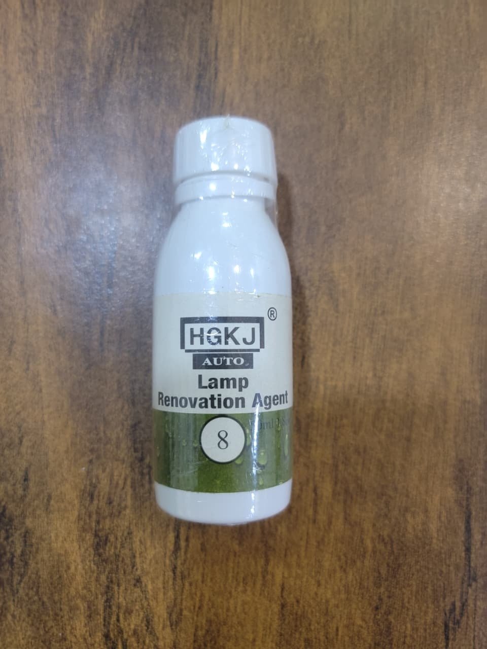 HGKJ-8 car headlight restoration agent restoring yellowed headlights to clear shine. Caption Text: